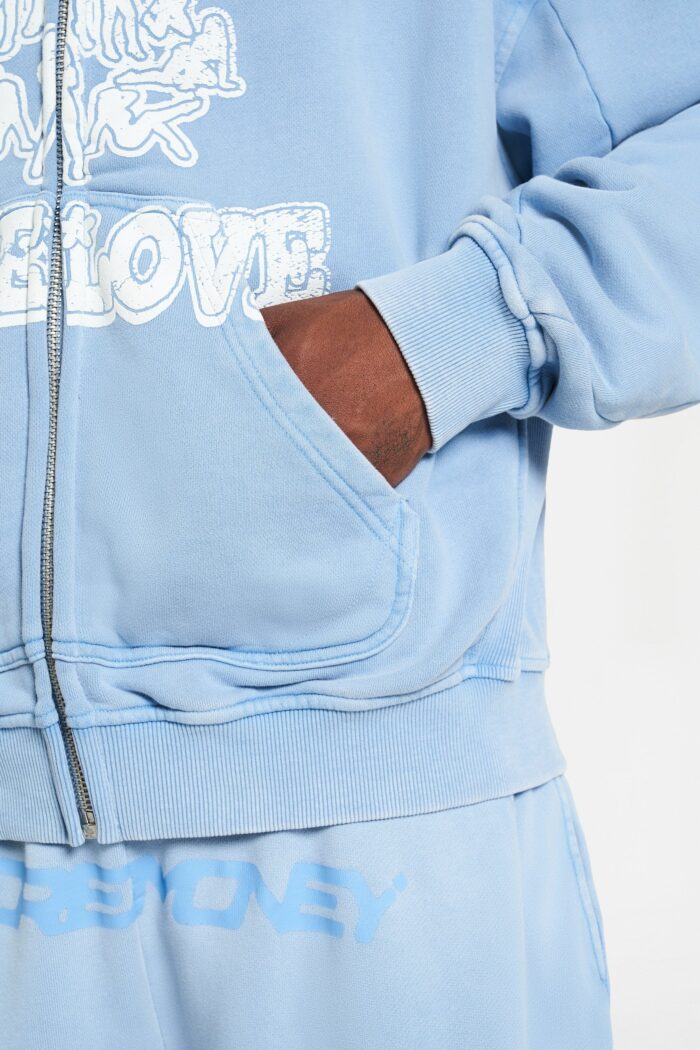 Adultery Zip Azure Washed: Elevate your streetwear with this stylish Azure Washed zip hoodie.
