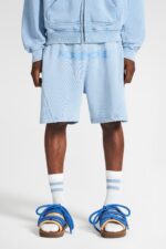 More Money Logo Shorts Azure Washed: Elevate your style with these trendy Azure Washed shorts featuring the iconic More Money logo