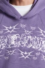 "Elevate your style with the Reversi Graphic Hoodie in Mulled Grape Purple.