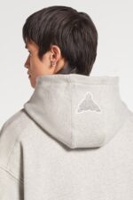 Glorious Gem Light Grey Hoodie: Elevate your streetwear with this stylish light grey hoodie featuring a dazzling gem design.