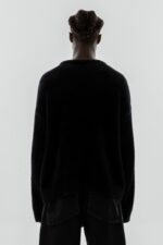 Elevate your style with the Affirmation Mohair Sweater in Black.