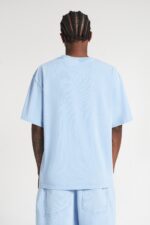 Adultery Tee Azure Washed: Elevate your street style with this trendy Azure Washed tee.