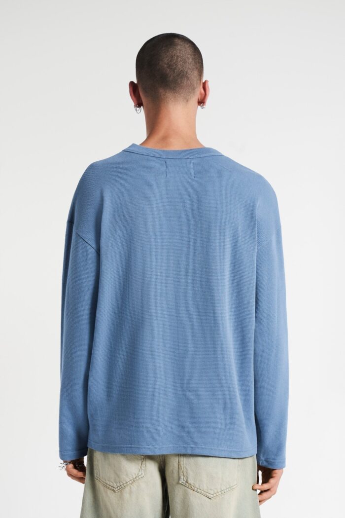 Elevate your style with the Paper Doll Longsleeve in Nightshade Blue.
