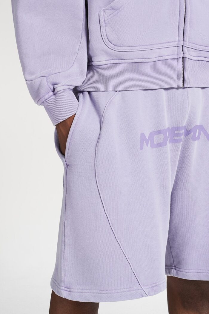 More Money Logo Shorts Purple Washed: Elevate your style with these trendy Purple Washed shorts featuring the iconic More Money logo.