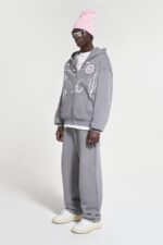 Open Leg Ash Jogger: Embrace comfort and style with these ash-gray joggers featuring an open leg design.