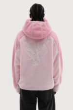 "Pink multifaced fleece, a cozy and stylish winter essential with a versatile design for added warmth and fashion."