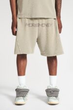 More Money Logo Shorts Grey Washed: Elevate your style with these trendy Grey Washed shorts featuring the iconic More Money logo.