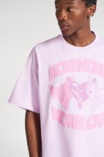 Three Heart Tee Pink: Embrace sweetness and style with this pink tee featuring three hearts.