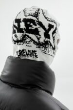 Elevate your style with the More Money Balaclava in White.