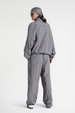 Grey track jacket, a versatile and stylish athletic wear piece perfect for a casual and sporty look.