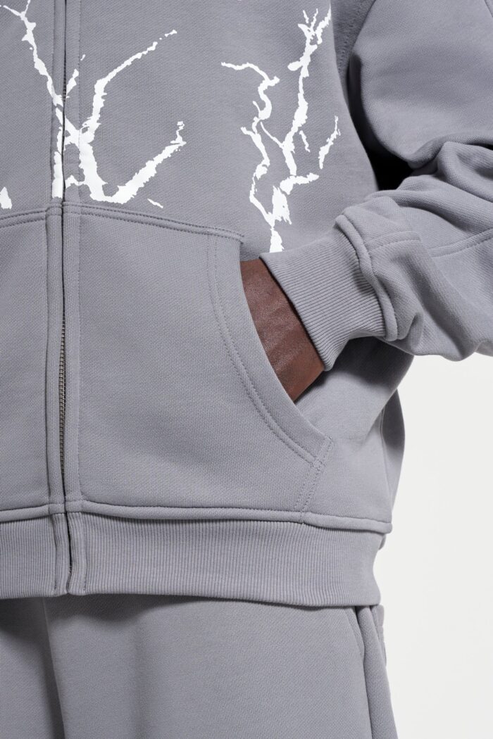 Money Rooted Zip Ash: Step into urban style with this ash-gray zip hoodie.