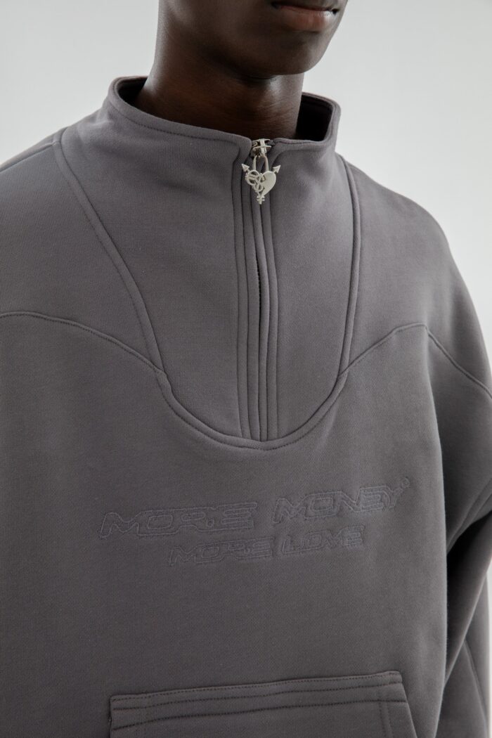 Elevate your style with the More Money Logo Halfzip in Stone Grey.